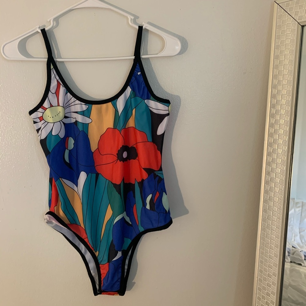 Brand new! Never worn festival bodysuit fits s/m